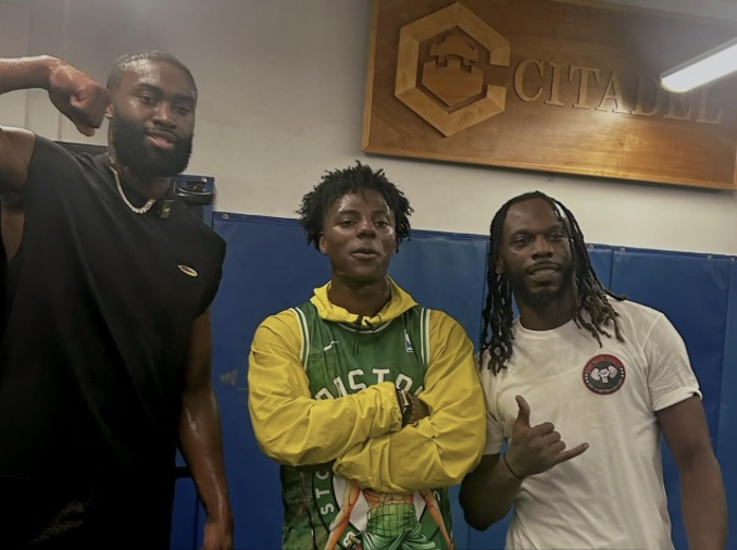 Lionel Young with NBA guard Jaylen Brown